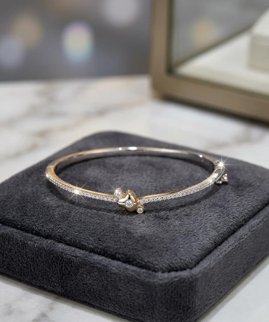 Two-Tone Bow Pave Bangle in silver